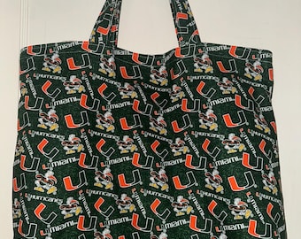 Bolso de mano reversible y lavable hecho a mano de la Universidad de Miami (UM).