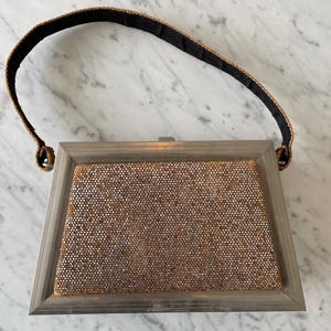 Bolso vintage de aluminio y tela con incrustaciones de plata