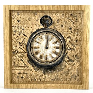 May include: A wooden relief carving of a pocket watch with Roman numerals on the clock face. The watch is set against a textured background within a square wooden frame. The carving is in shades of brown and tan.
