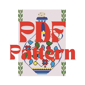 May include: A PDF pattern for cross-stitch embroidery featuring a colorful, stylized vase with floral designs. The text "PDF Pattern" is overlaid on the image.