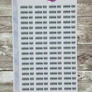 May include: A sheet of white sticker paper with 48 black and white stickers. Each sticker has the text "custom text" printed on it.