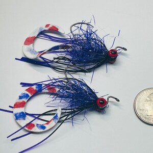 Twister Tail Bass y Snakehead Fly
