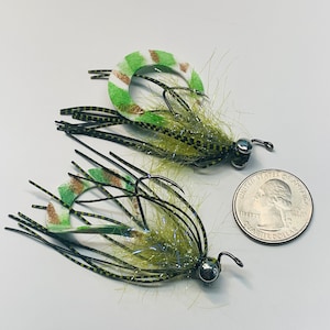 Twister Tail Bass y Snakehead Fly