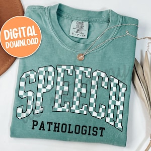 May include: A teal Comfort Colors t-shirt with the words "SPEECH PATHOLOGIST" in a white checkered design. A gold necklace with a pendant rests on the shirt. An orange circle with the words "DIGITAL DOWNLOAD" is in the upper left corner.