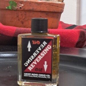 Lucky Mojo Curio Company: Reversal oil. Used in Hoodoo and Rootwork to send crossing, tyings, jinxes, and curses back to the sender of juju