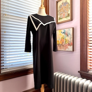 May include: A rustic wooden sign with the text "Welcome to our home" in white lettering. The sign features a distressed finish and a simple, inviting design, perfect for a front porch or entryway.