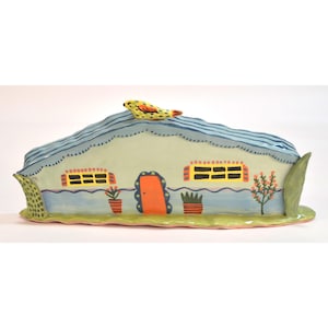 Wide Ranch House. Two 3D Trees. Two Potted Plants. One 2D Shrub. Bird on Roof.