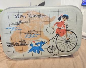 Vintage child's Miss Traveler suitcase