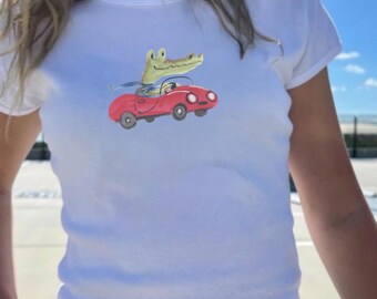 Cool Crocodile Driving Red Car T-Shirt | Funny Animal Graphic Tee | Cute Cartoon Crocodile Shirt | Quirky Summer Casual Top |