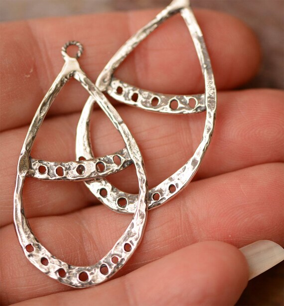 PN-772 Artisan Curved Bar Pendant with 9 Holes in Sterling Silver PN-772 Artisan Curved Bar Pendant with 9 Holes in Sterling Silver