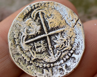Moneda de naufragio, real español en plata de ley SS-545