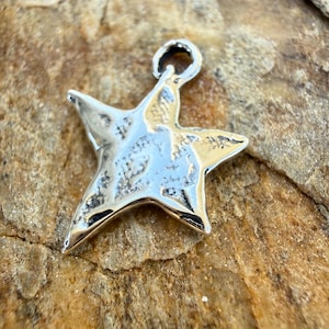 Dancing Star Sterling Silver Charm