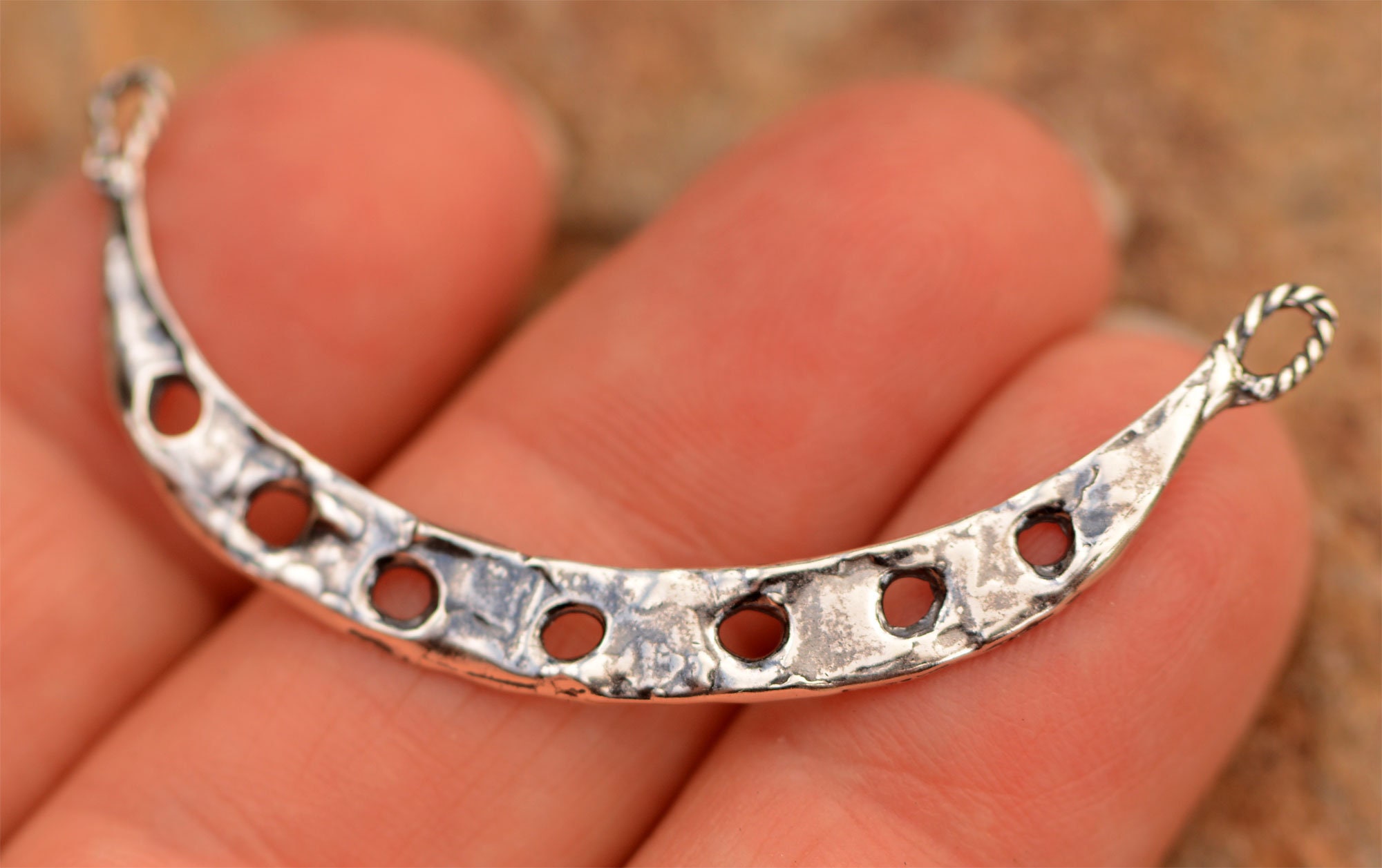 PN-772 Artisan Curved Bar Pendant with 9 Holes in Sterling Silver PN-772 Artisan Curved Bar Pendant with 9 Holes in Sterling Silver