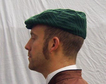 Flat cap in forest green made with upcycled cotton corduroy