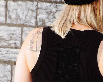 Upcycled cotton sweater vest with skull and bones insert size medium large