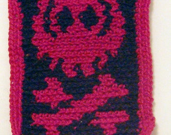 Skull and bones patch in crocheted black and red cotton