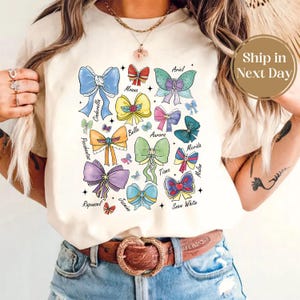 Coquette Bows Watercolor Disney Princess Shirt, Disney Aurora Ariel Belle Cinderella Tiana Shirt, Magic Kingdom Disneyland Girl Trip 2025