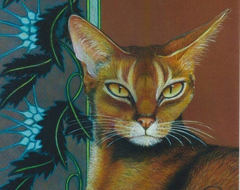 May include: A close-up of a brown Abyssinian cat with green eyes, looking directly at the viewer. The cat is partially hidden behind a decorative, blue and green patterned background.
