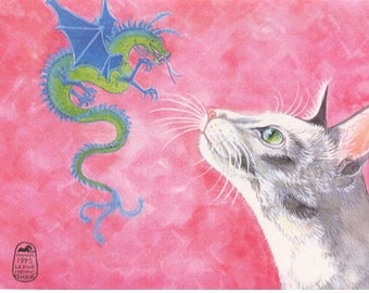 May include: A green dragon with blue wings flies in the air, looking at a white and gray cat with green eyes. The background is a light pink color.