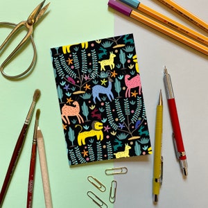A6 Mini Notebook - The Lion and the Hare - Decorated with a folk art inspired pattern