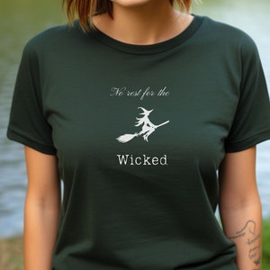 Witch Humor T-Shirt, Flying Witch on Broom Graphic, Minimalist Design, Wiccan Top, Witchy Vibes, Halloween Fan Apparel, Goth Apparel