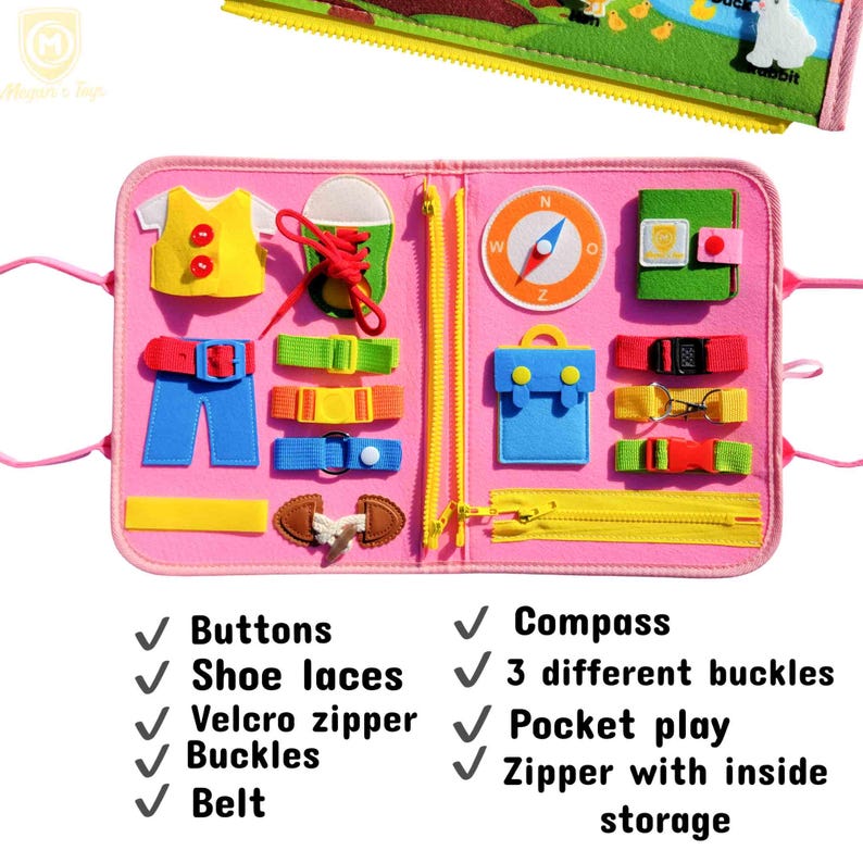 May include: A pink felt activity board with various interactive elements. Features include buttons, shoe laces, a Velcro zipper, buckles, and a belt. Additional elements are a compass, three different buckles, pocket play, and a zipper with inside storage.