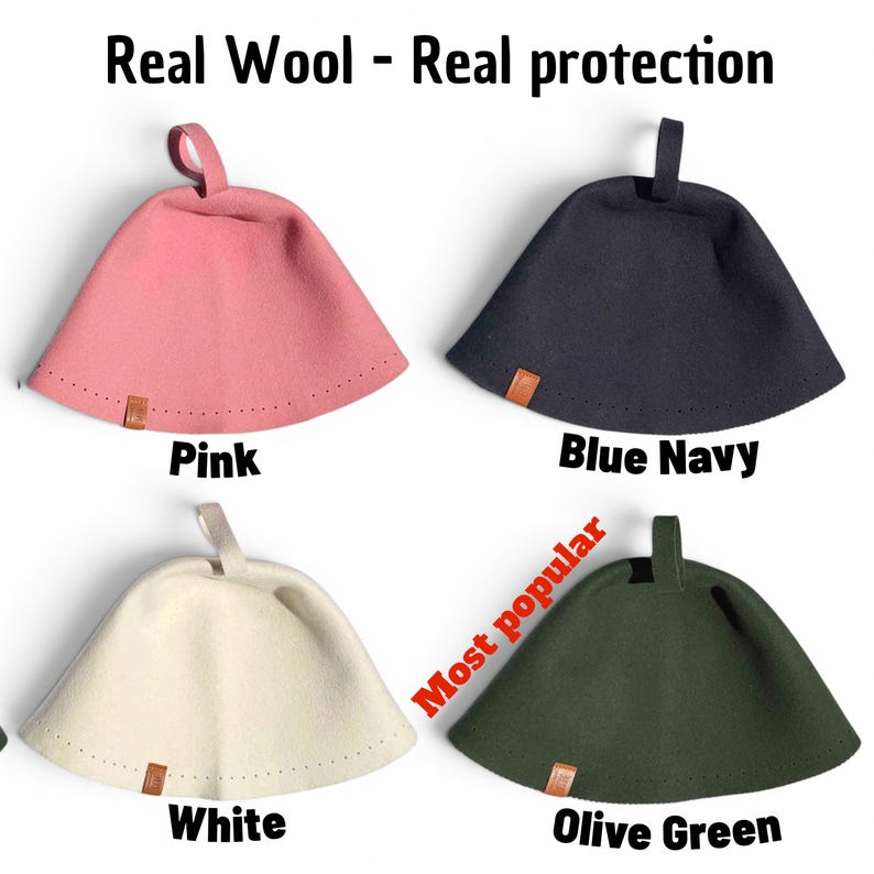 May include: Four felted wool sauna hats with hanging loops, labelled Pink, Blue Navy, White, and Olive Green. The text Real Wool - Real protection appears at the top, and the text Most popular is next to the olive green hat. Each hat has a small tag.