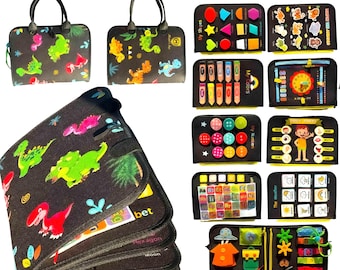 May include: A black fabric busy board book with dinosaur prints, featuring various interactive learning pages including shapes, animals, colors, a clock, numbers, body parts, the alphabet, weather icons, and clothing fasteners.