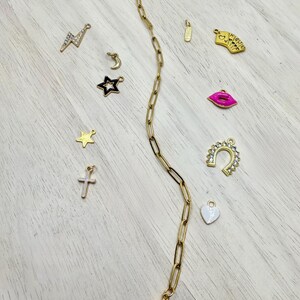Medium gold paperclip trucker hat chain. Customized trucker hat chains. Handmade Trucker hats. To add charm, specify in personalization.