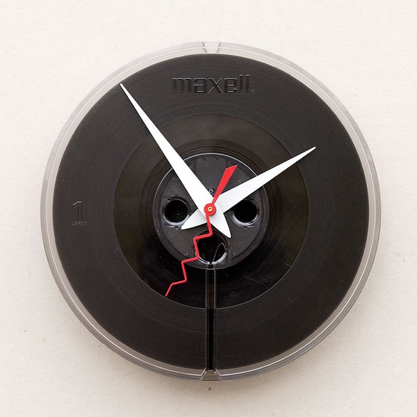 Clock made from a recycled magnetic tape reel