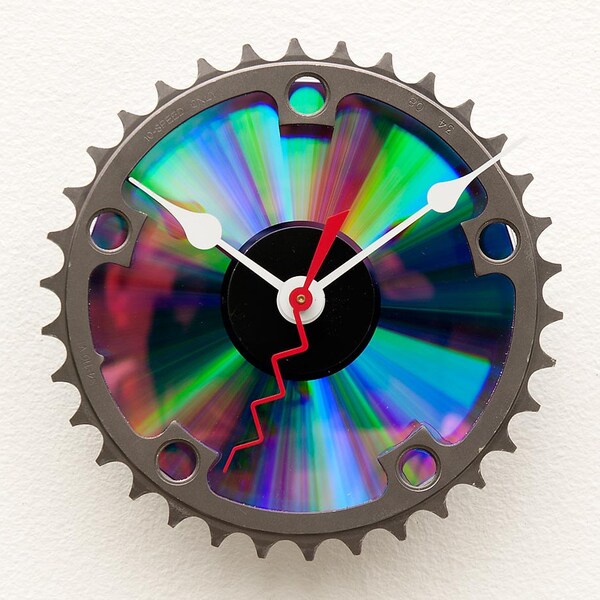 Clock made from a recycled Bike chainring and a DVD