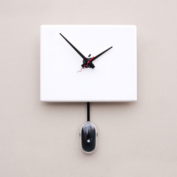 Clock created from a recycled Apple ibook laptop cover