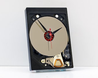 Computer hard drive clock, geek, nerd, repurpose, reuse, reclaim, steampunk, recycle, upcycle, gift, PC, time, wall, battery, desk, office,