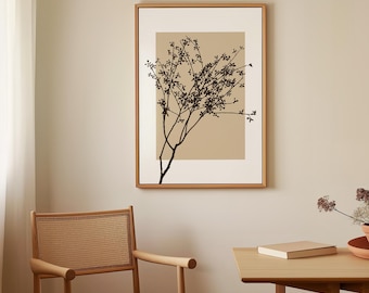 May include: A framed print of a black silhouette of a branch with leaves against a beige background. The frame is a light wood color.