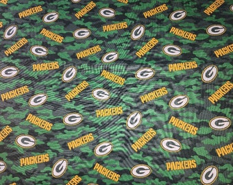 Cotton Fabrics REMNANT| FOOTBALL teams, Green Bay Packers, logo, camo fabric background | 36" length by 44-45 inches width