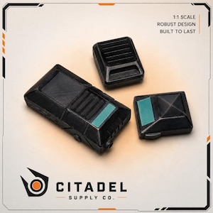 May include: Three black, geometric game pieces with teal accents. The pieces are labeled "1:1 SCALE, ROBUST DESIGN, BUILT TO LAST." The Citadel Supply Co. logo is in the lower left corner.