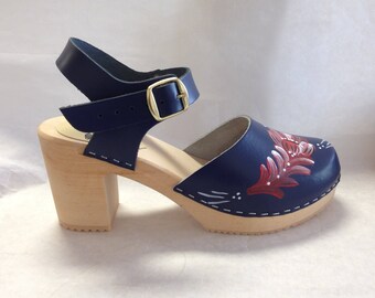 Navy blue Mary Jane on a natural Super High Heel with buckled ankle strap and red painted kirbits
