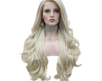 May include: A long, wavy blonde wig with a lace front. The wig features voluminous curls and a natural-looking hairline. The hair is a light, ashy blonde color. The wig is styled on a mannequin head, showcasing the hair's texture and movement.