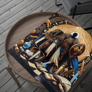 May include: A wrapped gift with a brown ribbon sits on a round wooden table, atop a sheet of wrapping paper. The wrapping paper features a detailed illustration of a knight in blue and gold armor, surrounded by fantasy elements on a black background.