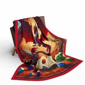 May include: A red dragon blanket with a book, dice, and other fantasy elements. The blanket is red with gold accents and features a dragon with its wings spread.