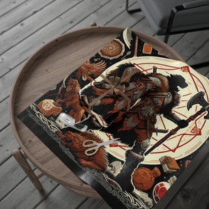 May include: Gift wrap featuring a warrior design in shades of brown, black, and cream. The illustration includes a warrior with an axe, a wolf, and other Viking-themed elements. A brown ribbon is tied around the wrapped gift. Scissors and tape are also visible.