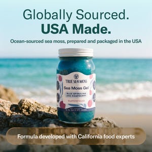 May include: A glass jar of blue sea moss gel with a white lid and label reading True Sea Moss, Sea Moss Gel, Blue Spirulina and Raspberry, Superfood, Net Contents 16 fl oz (1 pt) 453ml. Text reads Globally Sourced, USA Made, and Formula developed with California food experts.