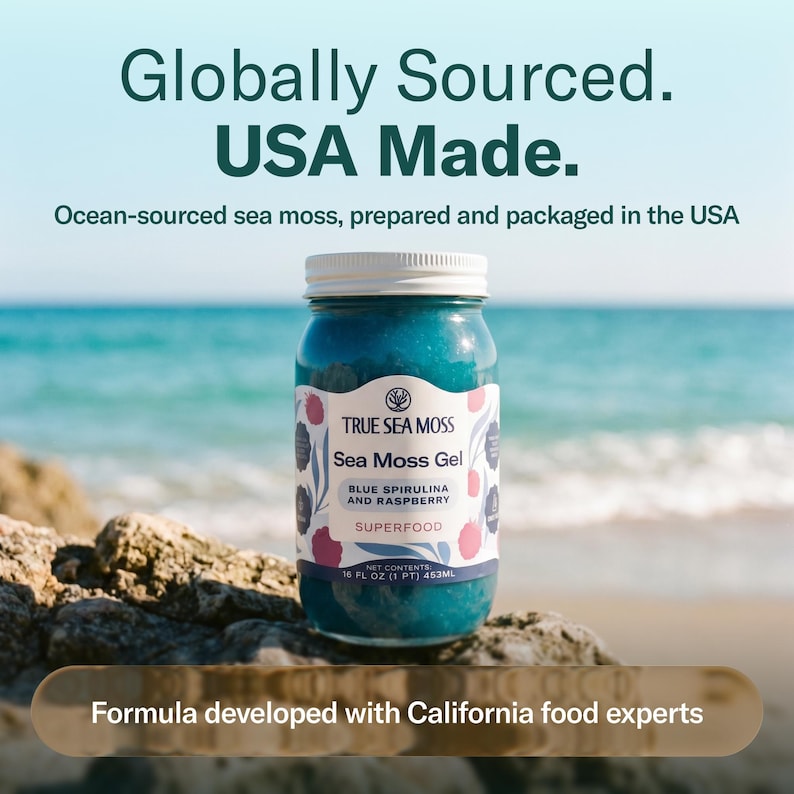 May include: A glass jar of blue sea moss gel with a white lid and label reading True Sea Moss, Sea Moss Gel, Blue Spirulina and Raspberry, Superfood, Net Contents 16 fl oz (1 pt) 453ml. Text reads Globally Sourced, USA Made, and Formula developed with California food experts.