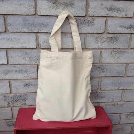OM design on Unbleached canvas book bag Reusable carry bag