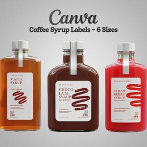 Peut inclure: Trois bouteilles en verre contenant des sirops d'érable, de chocolat et de fraise avec des étiquettes blanches. Chaque étiquette porte le texte "Brand Name", la saveur du sirop et un tourbillon graphique. Les bouchons sont blancs avec une bande.