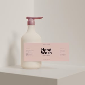May include: A white hand wash bottle with a pink pump and a pink label. The label reads "Hand Wash clean hands" and lists ingredients. The bottle contains 8 fl oz / 237 mL of product.