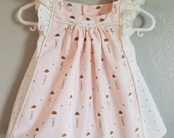 Baby girl dress with flutter sleeves, gold and cream flamingos on pink background, and cream with gold dots, size 3-6 months,  ready to ship