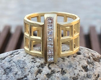 Grid Ring in 18kt Gold w/3/8ctw Princess Diamonds in a Sturdy Channel Set Bar