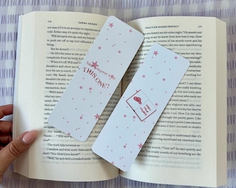 May include: Two pink and white bookmarks with a star pattern. One bookmark has the text "Have you ever tried this one?" and the other has the text "Small tour country".
