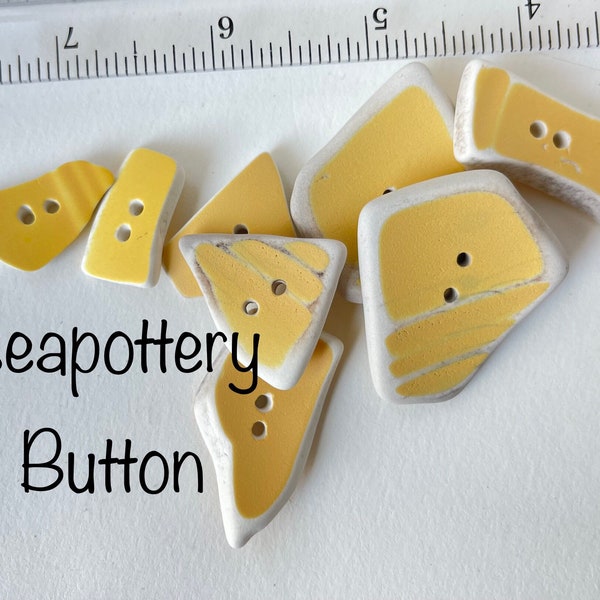 1 sea pottery inspired yellow apparel button,  made from pieces of a popular pattern of brightly colored vintage dinnerware.   1 button.